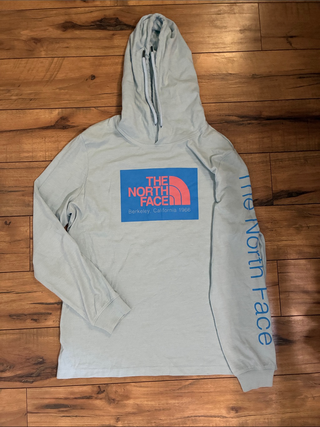 The North Face Lightweight Blue Hoodie With Bright Blue & Coral Logo